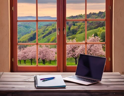 Firefly AI generated image of a desktop with laptop and notebook, pens, pencils. Window looking out on hillside covered with spring flowers in bloom.